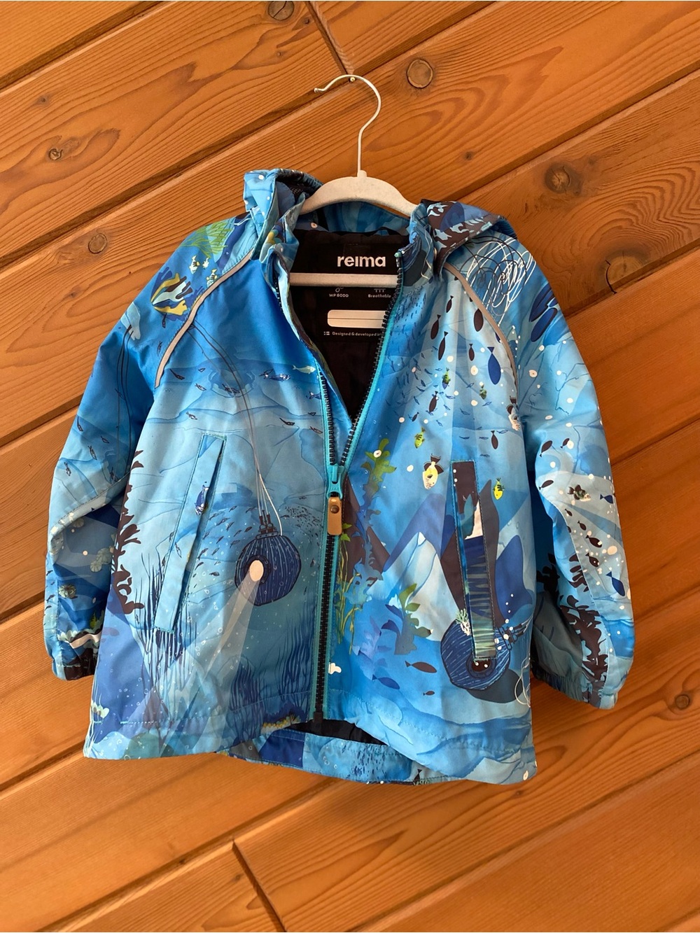 Reima Blue Kids' Waterproof Hooded Raincoat with Ocean Print